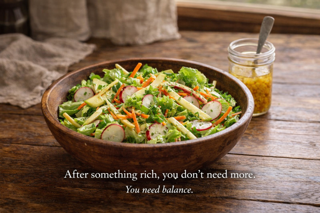 Crisp garden salad with radish, carrot, apple, and lemon shallot vinaigrette in a rustic bowl